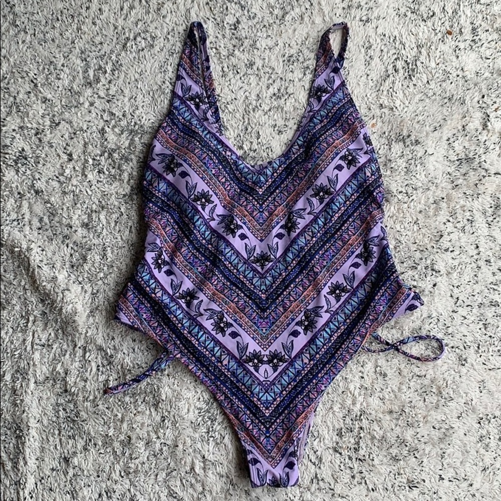 Kendall’s and Kylie purple one piece